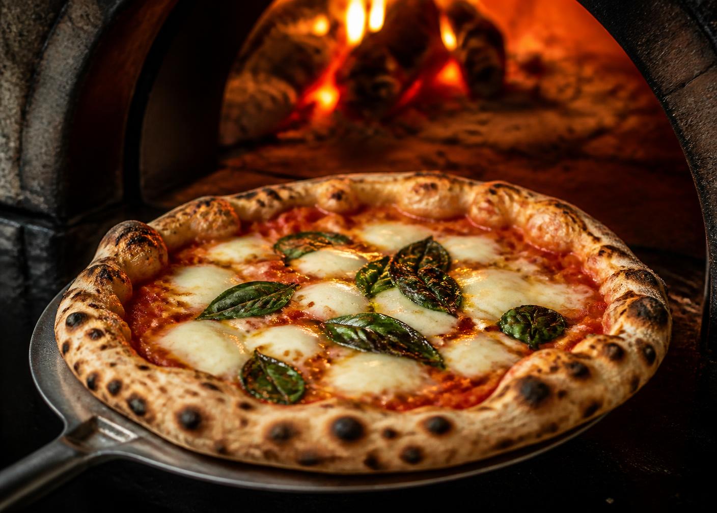 Artisan pizza coming out of a wood-fired oven on a metal peel